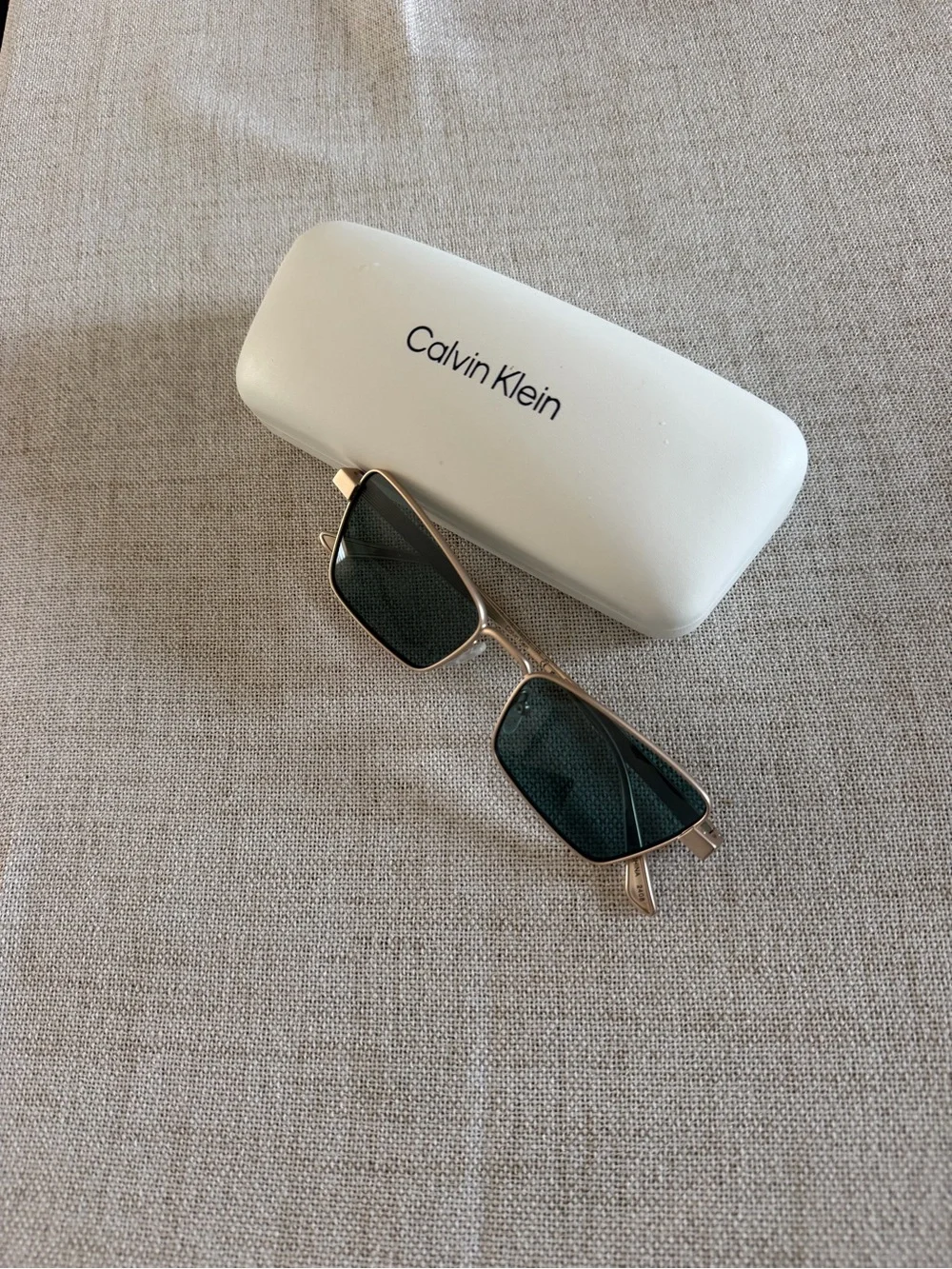 New Calvin Klein gold-tone frame sunglasses.